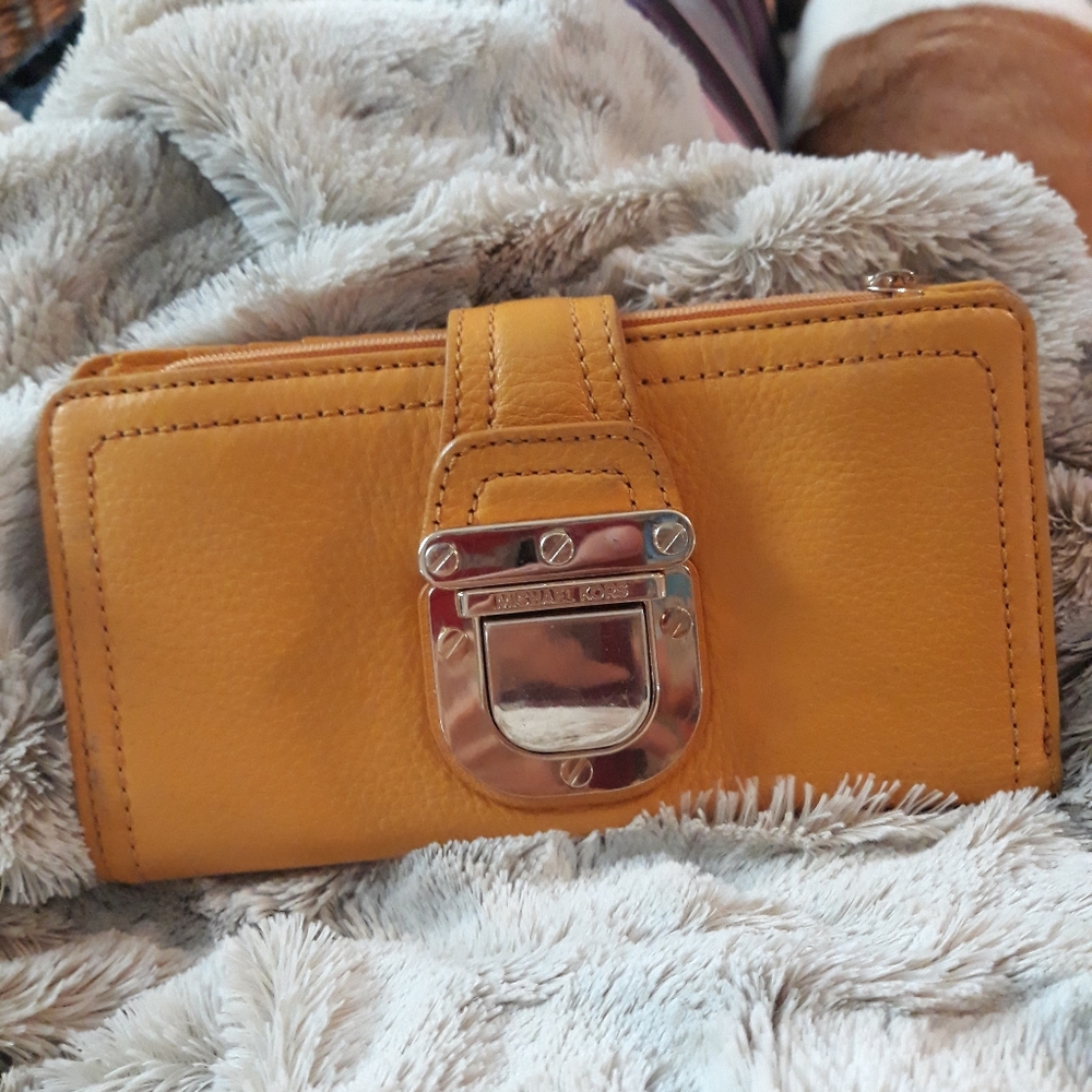 Michael Kors yellow soft organizer wallet. Buckle